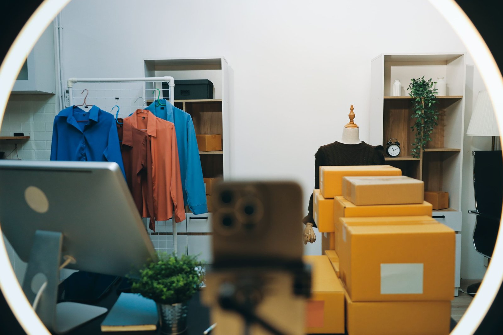 vecteezy-a-view-of-a-room-with-boxes-and-clothes-70199475