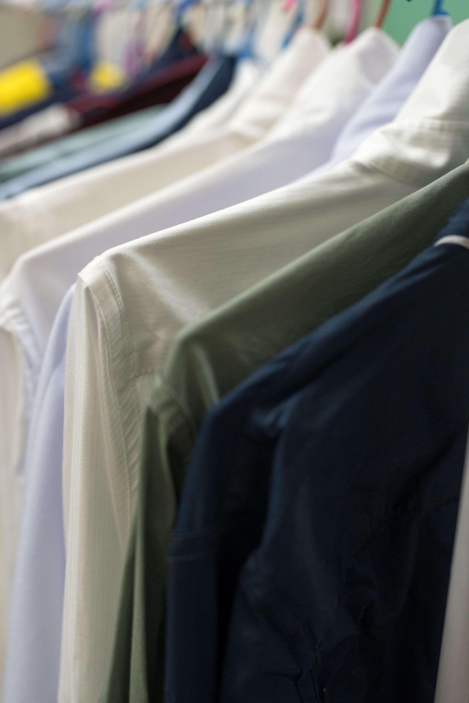 vecteezy-hangers-with-clothes-at-home-or-in-a-store-53115257